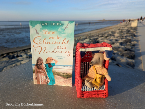 "Immer wieder Sehnsucht nach Norderney" von Jani Friese am Strand von Norddeich.